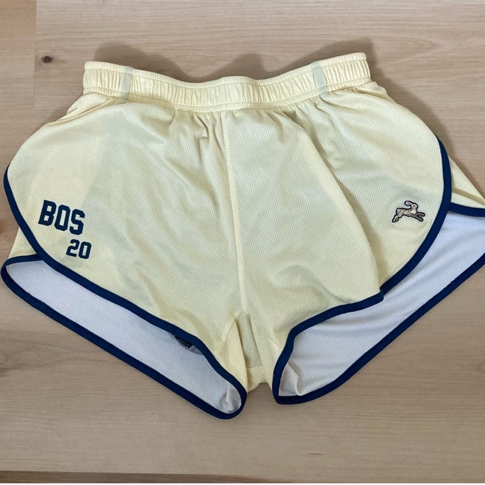 Tracksmith Van Cortlandt Yellow Athletic Shorts with Navy Trim